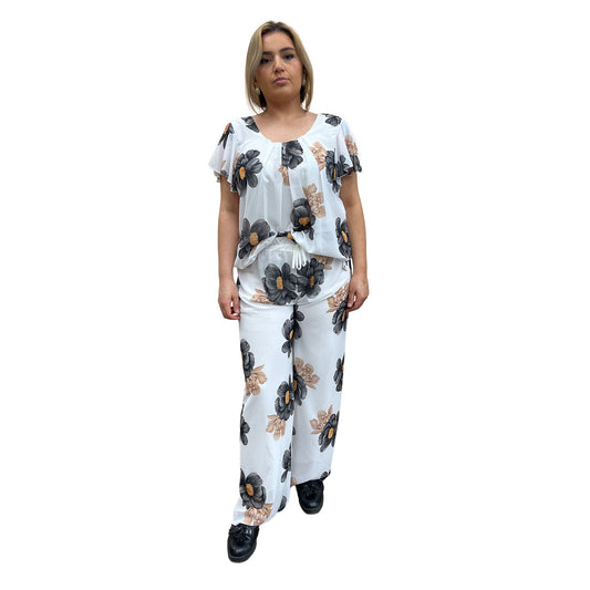 Broekset met bloemen - zwart