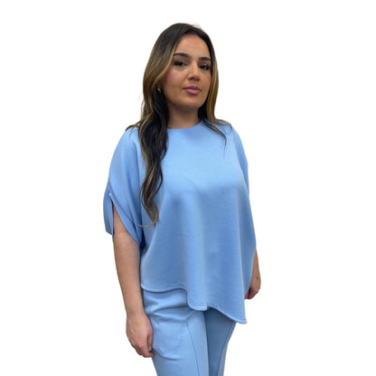 Odi tweedelig set asymmetrisch met korte mouwen - licht blauw